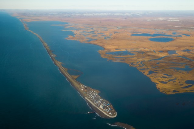 This aerial photo shows the island village of Kivalina, an Alaska Native community of 400 people already receding into the ocean as a result of rising sea levels.